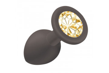 Чёрная анальная пробка Emotions Cutie Small с жёлтым кристаллом - 7,5 см.