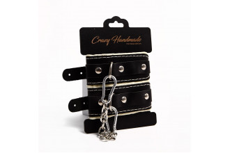 Черные скругленные наручники с мягкой бежевой подкладкой Черные скругленные наручники с мягкой бежевой подкладкой