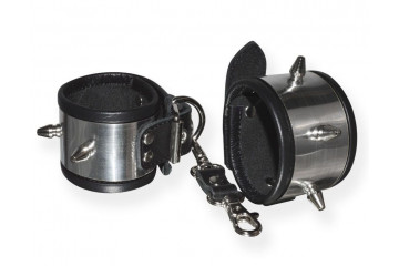 Серебристо-черные наручники с шипами и металлическим блеском