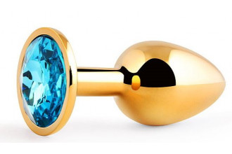 Золотистая анальная пробка с голубым стразом - 7,2 см.