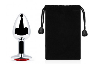 Серебристая анальная пробка с красным стразом - 7,2 см. Серебристая анальная пробка с красным стразом - 7,2 см.