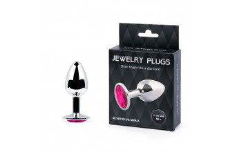 Серебристая анальная пробка с малиновым кристаллом - 7,2 см. Серебристая анальная пробка с малиновым кристаллом - 7,2 см.