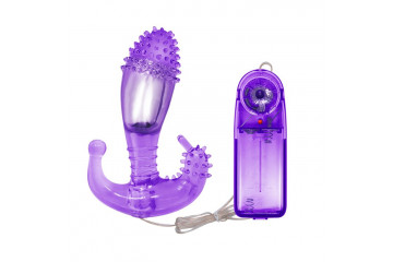 Фиолетовый вибростимулятор с шипами на головке - 14,3 см.