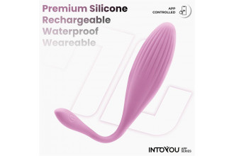 Нежно-розовое интерактивное виброяйцо с функцией вращения Rotating Beads